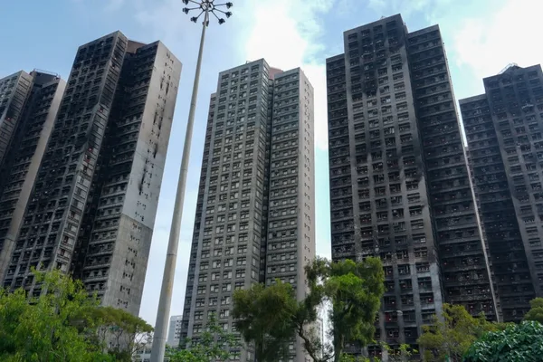 HK Govt to Handle Wang Fuk Court Fire Insurance Claims Under Buy-Back Plan