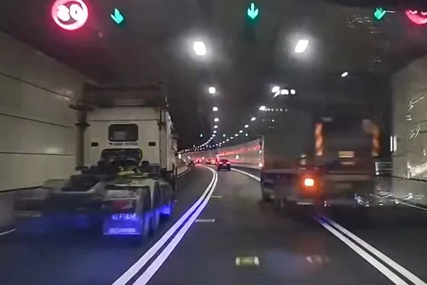 Hong Kong police arrest 2 drivers over alleged truck racing video