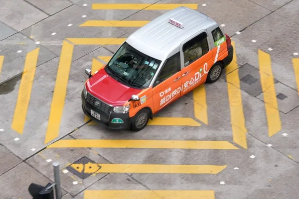Ride-hailing giants back Hong Kong's 10,000 permit cap