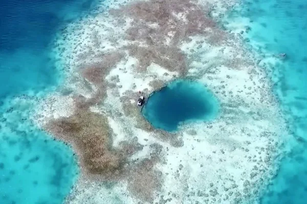 China discovers ancient coral reef blue hole in disputed Scarborough Shoal