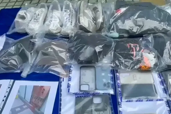 Hong Kong police arrest 8 teens for gang-recruited paint-splashing intimidation