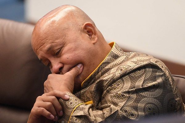 Philippine justice chief orders arrest of senator wanted by ICC