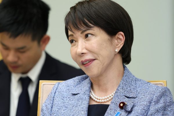 Japan PM backs aide amid smear campaign allegations