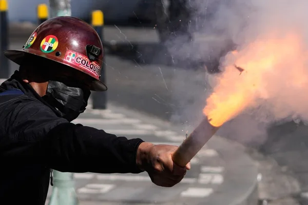 Bolivian President cuts salary amid escalating protests