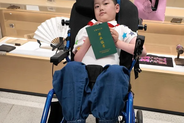 Chinese boy, 12, defies rare disease prognosis, graduates primary school