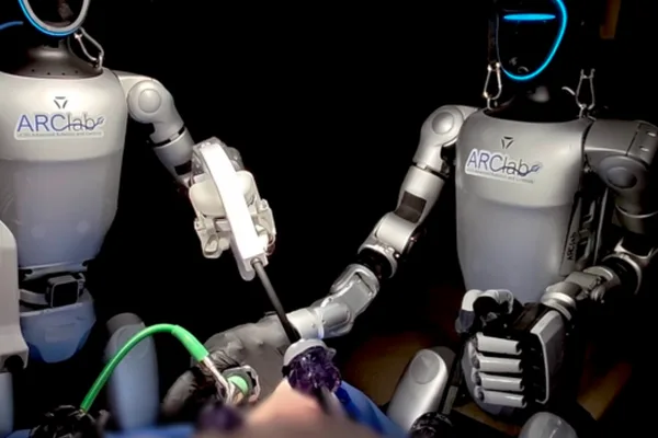 Surgeons remotely control humanoid robots for world-first surgery on pigs