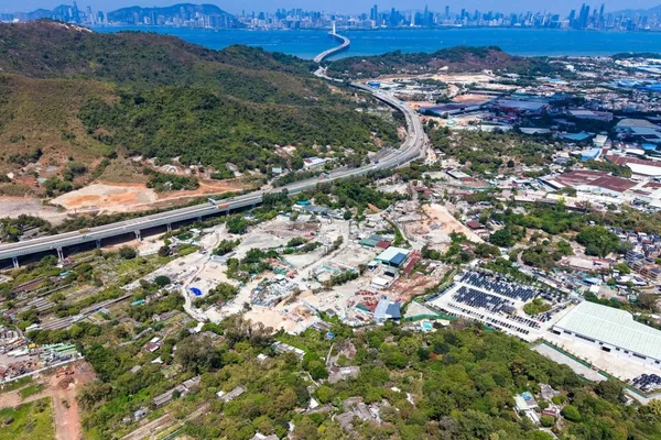 Hong Kong analysts urge cautious land supply for property market recovery