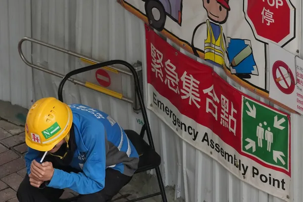Hong Kong proposes construction site smoking ban, citing AI impact