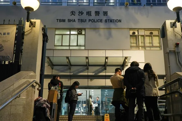 Hong Kong police officer admits upskirt filming and firearm offense