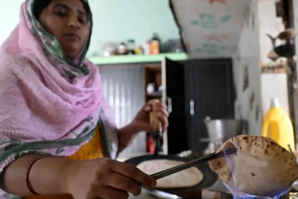 India leverages cow dung for biogas to alleviate cooking gas shortages.