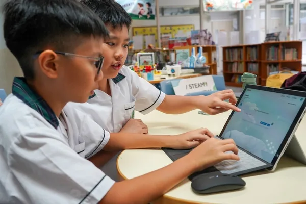 Hong Kong Education Chief: Master Technology, Don't Ban It