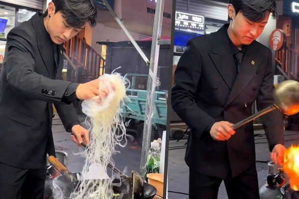 Suit-clad vendor goes viral selling fried rice