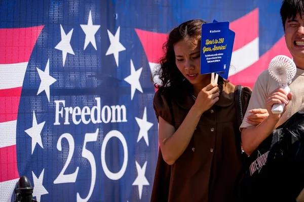 US heatwave cancels Fourth of July events, strains power grids
