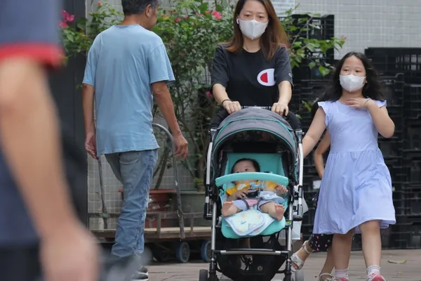Hong Kong to consult on continuing HK$20,000 baby bonus